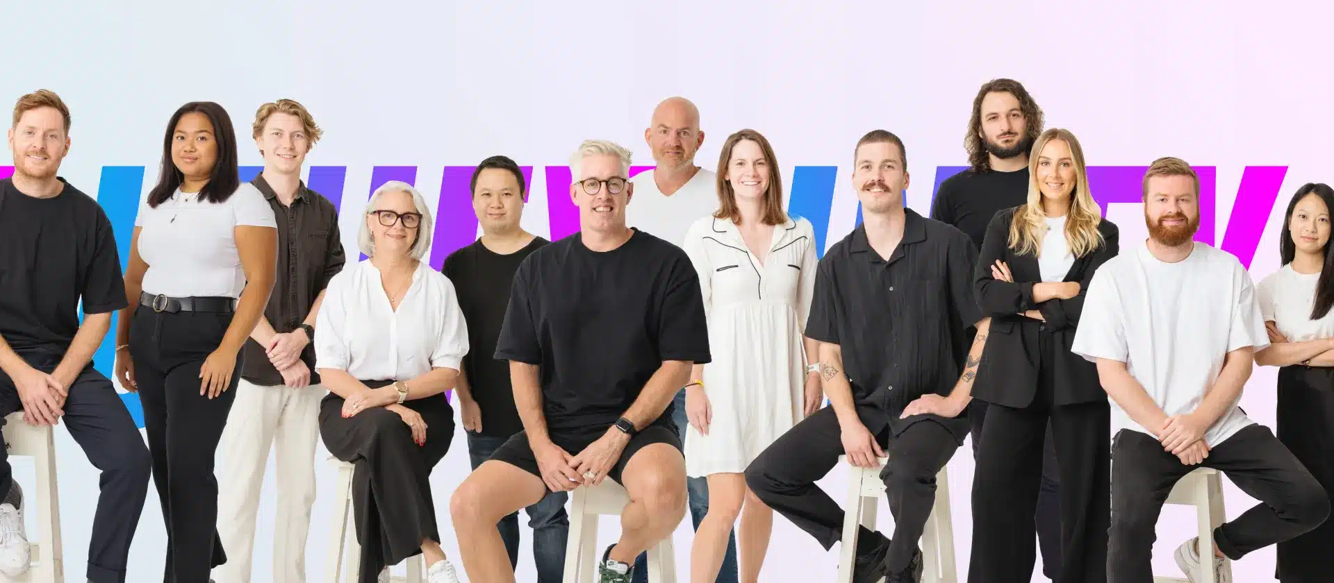 A photograph of the Unify team, superimposed onto a white background.